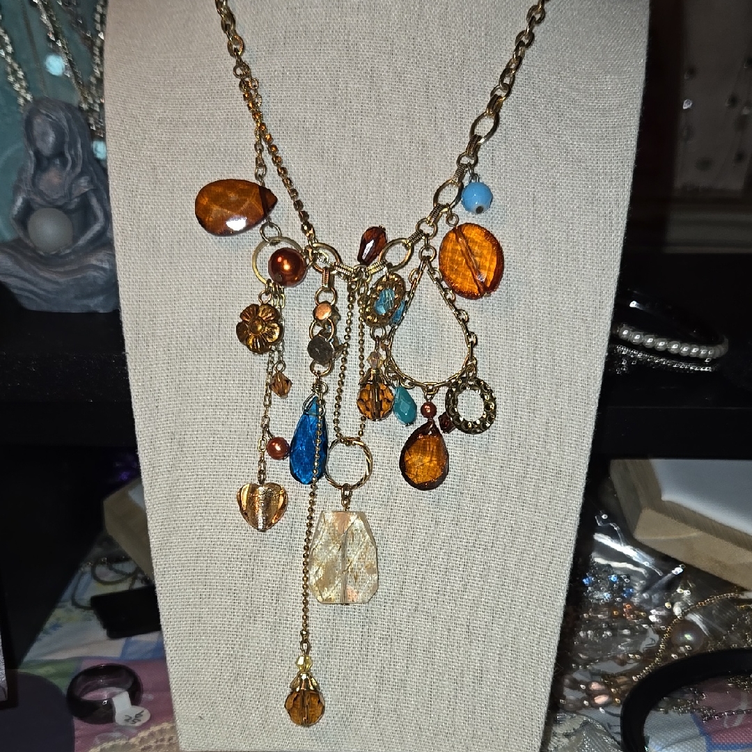 Elegant Gold And Orange Charm Necklace